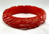 BB143 cherry red vine carved bakelite bangle